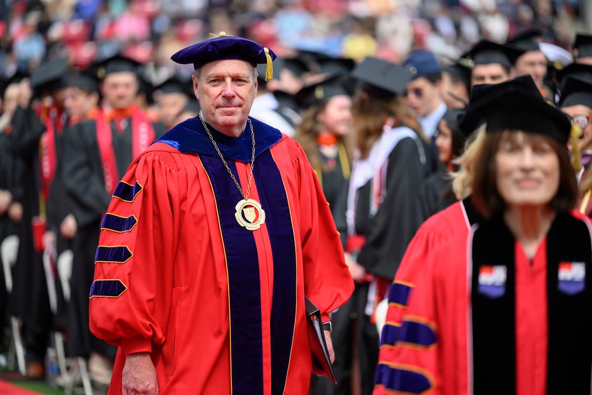 President Marty Schmidt processes into Commencement wearing Presidential Medallion.