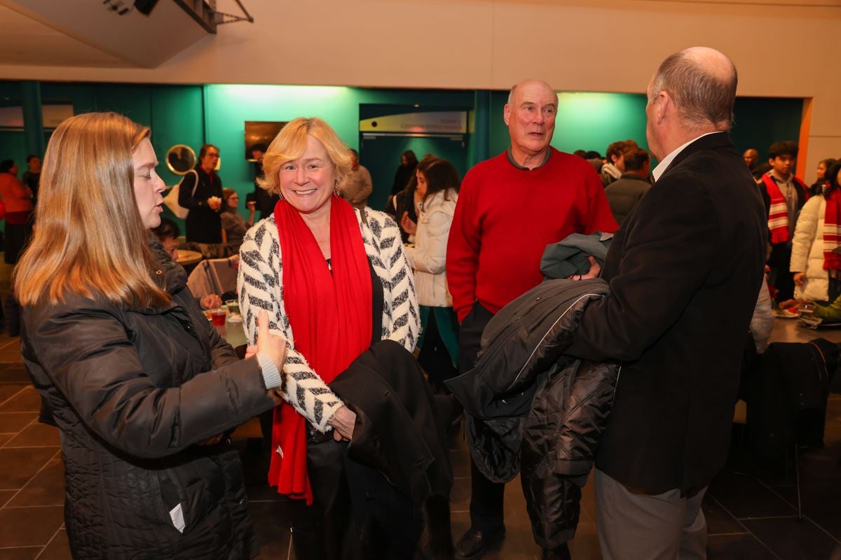 President Marty Schmidt and Lyn greet guests in Evelyn’s Café after Holiday Concert.