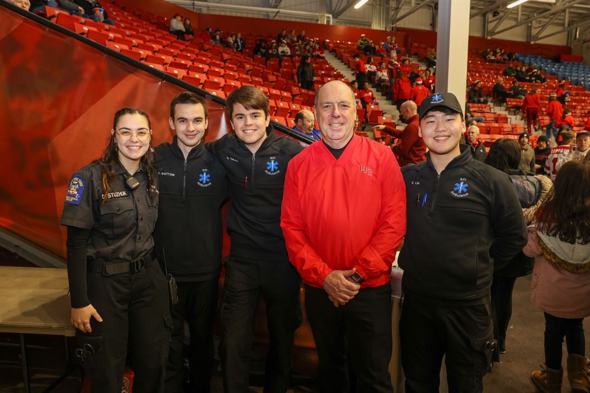 President Marty Schmidt with students from RPI Ambulance at the Big Red Freakout.
