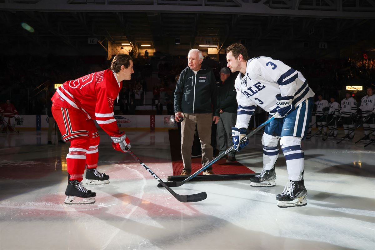 Alumnus Lloyd Bauer drops the puck at the Big Red Freakout.