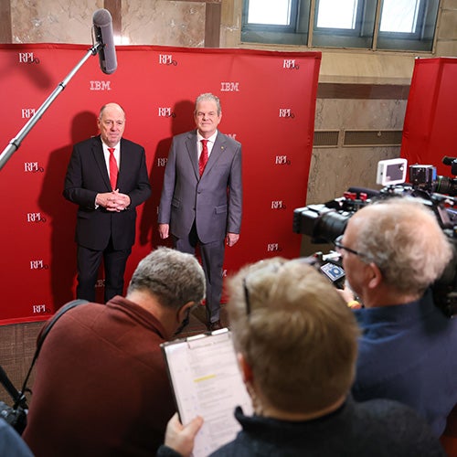 President Schmidt and Trustee Priem at press conference for unveiling of the quantum computer