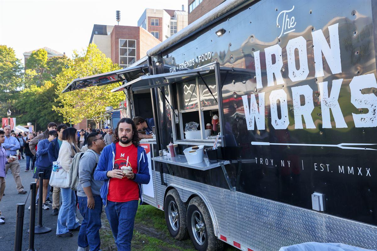 Student getting food from food truck.