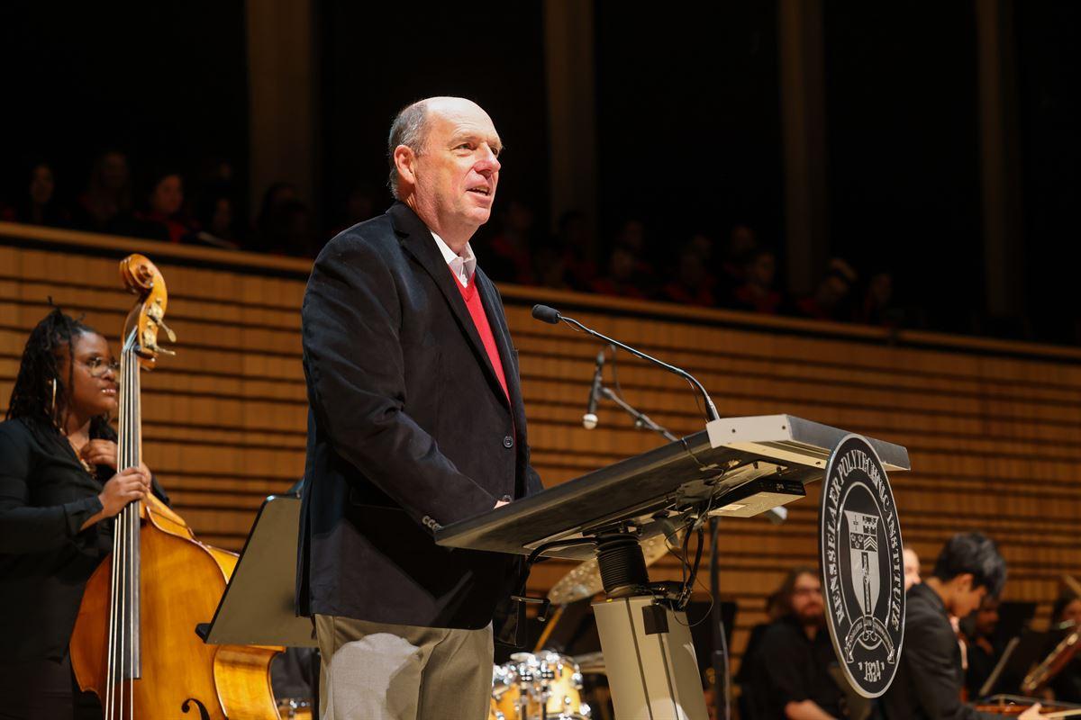 President Schmidt greets the audience at the Holiday Concert.