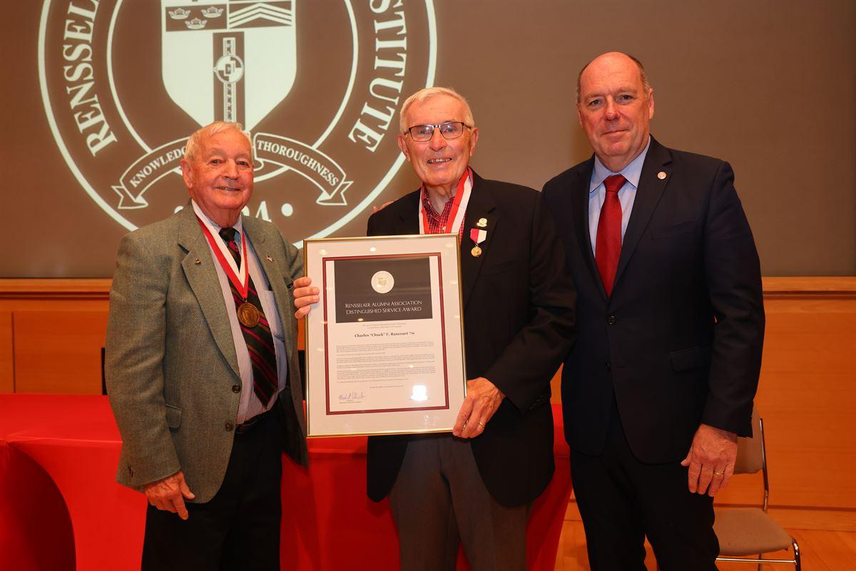 President Schmidt with alumni at RAA Awards Dinner.