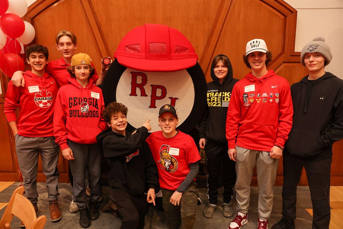 Young hockey fans with Puckman at the Big Red Freakout Ice House.