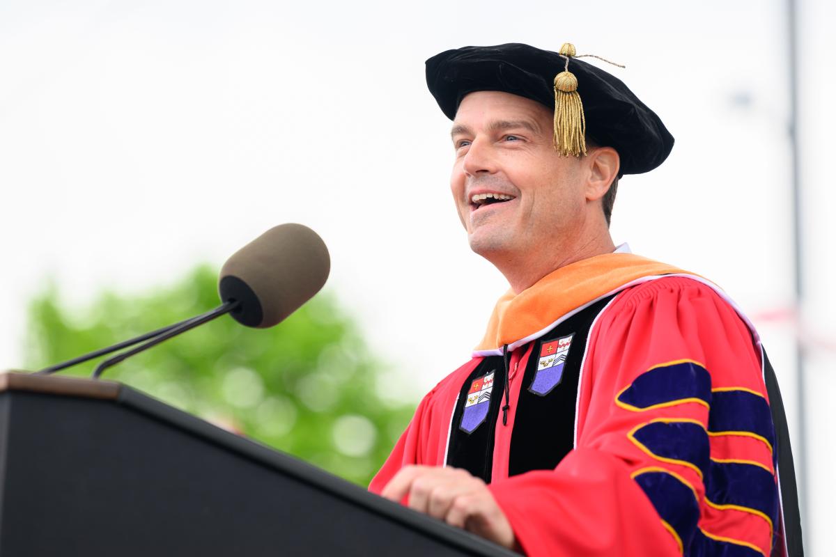 Commencement honorary degree recipient Reid Wiseman addresses the Class of 2024.