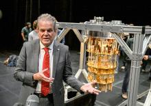 Nvidia co-founder poses with RPI's Quantum Computer