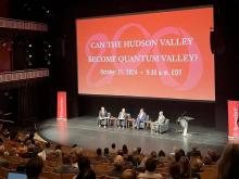 Panel on stage at RPI discussing the Hudson Valley becoming the Quantum Valley